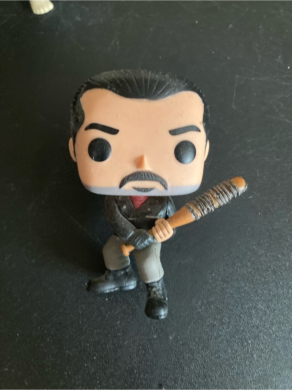 Funko Pop! Figure with Black Hair, Tan Skin, Brown Bat